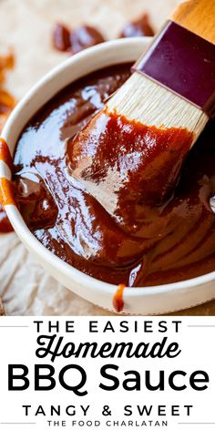 the easy homemade bbq sauce is in a white bowl with a wooden spatula