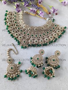 This exquisite emerald green bridal set is the perfect choice for the bride who wants to make a statement on her special day. The antique gold plating adds a touch of sophistication and elegance, while the sparkling champagne stones and superior craftsmanship make this set truly breath-taking. Whether you're tying the knot in an Indian or Pakistani wedding, this set is sure to turn heads and leave a lasting impression. Product Details: * Necklace -  Comes with adjustable zari cord.  * Earrings - Pakistani Wedding Jewelry, Cord Earrings, Polki Choker, Maang Tika, Sparkling Champagne, Indian Wedding Jewelry Sets, Necklace Set Indian, Asian Jewelry, Earrings Indian