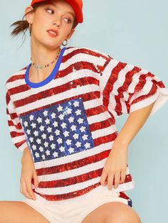 This fully sequin short sleeve top features patriotic red and white stripes and a charming star detail in the center, making it the perfect choice for holiday celebrations like Memorial Day and the 4th of July. The sparkle of sequins will display just the right amount of patriotism and make you stand out in any event. 100% Polyester. Blue Sequin Top, Sequin Short, America The Beautiful, American Flag Design, Patriotic Flag, Sequin Shorts, Sequin Fabric, Red And White Stripes, Sequin Top