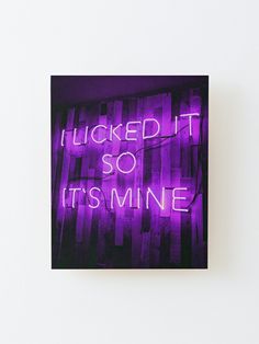 a purple neon sign that says i looked it so it's mine on the wall