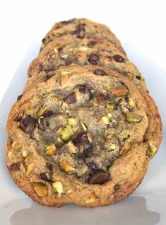 chocolate chip and pistachio cookies with text overlay that reads, dark chocolate thinening cookies