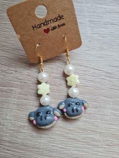 Featuring everyone's favourite hippo, these Moo Deng earrings are made with polymer clay accessorised with beads and sealed with UV resin Polymer Clay Flower Earrings, Clay Flower Earrings, Clay Flower, Polymer Clay Flowers, Uv Resin, Flower Earrings, Jewelry Earrings Dangle, Etsy Earrings, Polymer Clay