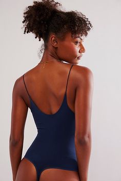 Our fav fam gets a new addition with this super plunge-neckline bodysuit from Intimately. **Fit:** Form-fitting, thong bottom **Features:** Seamless fabrication, spaghetti straps, plunging voop neckline, button gusset, built-bra **Why We | Clean Lines Plunge Bodysuit by Intimately at Free People in Blue, Size: M/L V-neck Seamless Bodysuit For Night Out, Seamless V-neck Bodysuit For Night Out, Low-cut Bodysuit With Built-in Bra For Night Out, V-neck Bodysuit With Built-in Bra For Party, V-neck Party Bodysuit With Built-in Bra, Party V-neck Bodysuit With Built-in Bra, V-neck Bodycon Bodysuit For Summer, Summer V-neck Bodycon Bodysuit, Blue Seamless Bodysuit For Loungewear