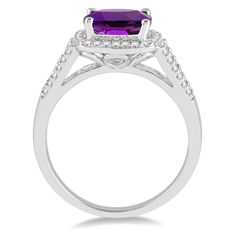 10K White Gold Cushion Cut Amethyst Ring with Diamond Halo and Accent Stones Center Stone: Amethyst Center Stone Shape: Cushion Center Stone Size: 8x8mm Diamond Shape: Round Total Diamond Weight: 0.25ct Stock Size: 7 Free ring sizing available in-store with purchase, contact us for more details. Round Cut Diamond Ring, Gemstone Diamond Ring, Stackable Wedding Bands, Trending Engagement Rings, Amethyst And Diamond Ring, Engagement Rings Bridal Sets, Ring With Diamond, Band Jewelry, Split Shank