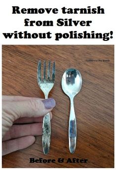 someone is holding two forks and one spoon with silver foil on it, which says remove tarnish from silver without polishing