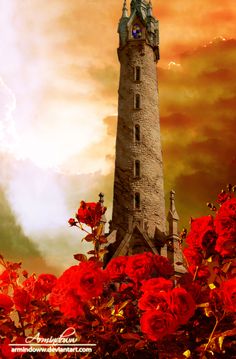 a tall tower with a clock on the top surrounded by red flowers and trees in front of a cloudy sky