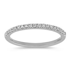 a white gold wedding band with diamonds