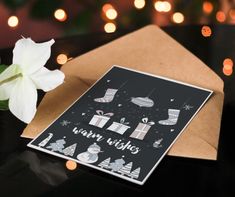 a greeting card with an image of christmas gifts on it and a white flower in the foreground