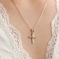 14k Gold Cross Pendant, Religious Jewelry, Christening, Dainty Cross Necklace, 14k Yellow Gold Crucifix Pendant, 16mm Small Size *Free Express International Shipping *14K solid gold chain is included if you choose. NEXT BUSINESS DAY SHIPPING! PRODUCT DETAILS *The product is made of 100% 14k Solid Gold and it has a 14K or 585 stamp on item. (We don't sell filled or plated jewelry) *The package includes a gold certificate.  *The product includes 14K solid gold chain. *Every package comes in a gift box. *14K gold indicates that the product is produced from 58% pure gold. *Chain thickness: 1.00mm *Pendant measures: 16.00mmx12.50mm (small size) *The product is yellow gold. *       Made in Türkiye. ORDER PROCESS *We have some options for the chain length.  ABOUT SHIPPING We ship all packages saf Classic Diamond Cut Crucifix Necklaces, Classic Diamond Cut Crucifix Necklace, Rose Gold Crucifix Necklaces For Anniversary, Rose Gold Crucifix Necklaces For Anniversaries, 14k Gold Crucifix Jewelry, 14k Gold Hallmarked Crucifix Jewelry, 14k Gold Crucifix Hallmarked Jewelry, 14k Yellow Gold Crucifix Jewelry, 14k Gold Crucifix Necklace With Diamond Cut