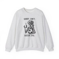 This cozy sweatshirt makes a special holiday gift for any occasion. Whether celebrating Christmas, Mother's Day, a Birthday or just showing you care, this soccer sweatshirt is a thoughtful and unforgettable gift.  ●PRINT  Our designs are printed using the highest quality professional direct to garment (DTG) process, meaning fabric grade ink is printed directly onto the garment and blends with the fibers. This allows us to achieve a vintage style look on many of our designs, and a feel that is similar to screen printing (which avoids the thick rubbery feeling of vinyl). *Slight variances in color and size are normal compared to what you see on a computer screen, however if you have any concerns please don't hesitate to reach out to us via Etsy messaging. ●SIZE Take a look at the photos to s Soccer Sweatshirt, In My Soccer Mom Era, Soccer Mom Era Shirt, Soccer Mom Sweatshirt, Soccer Mom Sublimation, Soccer Coach Gifts, Sports Mom Shirts, Soccer Coaching, Soccer Mom