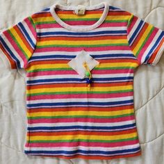 Little Topsys striped top with beads and applique size 24m modern but may wear longer. Shirt is in play condition due to busted hen stitching and some colorbleed. Still a fantastic piece and perfect 70s style. Measurements are 12 inches shoulder to hem 9 inches pit to pit Playful Striped Cotton Tops, Fun Striped Summer Tops, Applique Top, Beaded Applique, 70s Style, 70s Fashion, Woodstock, Kids Clothing, Hen