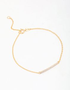 Add a signature touch to your look with this classic chain bracelet, This bracelet is crafted from genuine, 925 sterling silver and plated with real gold for a luxe touch. This chain bracelet is perfect for styling in your everyday stack, featuring a cubic zirconia encrusted bar for a modern finish. Material: Cubic Zirconia, Gold Plated, Sterling Silver Dimensions: Length 16.5cm | Lovisa Gold Plated Sterling Silver Cubic Zirconia Fine Bar Chain Bracelet, Clear Modern Gold Cubic Zirconia Chain Bracelet, Delicate Cubic Zirconia Chain Bracelet, Delicate Gold Chain Bracelet With Cubic Zirconia, Luxury Cubic Zirconia Gold Chain Bracelet, Luxury Gold-plated Silver Chain Bracelet, Gold Plated Sterling Silver, Real Gold, Chain Bracelet, Cubic Zirconia