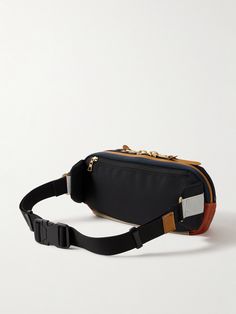 Master-Piece is an expert when it comes to crafting accessories that are equally as stylish as they are functional. This belt bag is made from colour-blocked nylon-twill and trimmed with durable leather. Between the internal and external compartments, there's plenty of space for your wallet, keys and sunglasses. Functional Travel Bag With Removable Belt, Functional Crossbody Bag With Removable Belt, Functional Shoulder Bag With Removable Belt For Travel, Functional Nylon Bags With Removable Belt, Blue Nylon Belt Bag For Everyday Use, Belt Bag For Men, Master Piece, Belt Bags, Craft Accessories