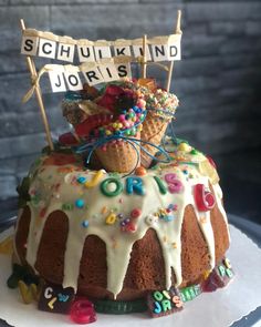 a bundt cake with icing and sprinkles on top