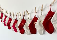 stockings hanging on a clothes line with the numbers ten and twenty hung from them to dry