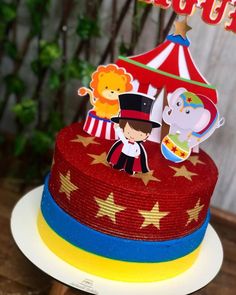 a circus themed birthday cake on a table