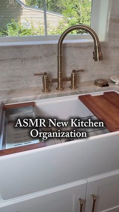 the kitchen sink is clean and ready to be used as a new kitchen organization area