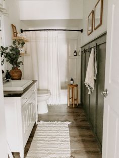 the bathroom is clean and ready to be used as a guest room or family room