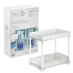 a clear shelf with two bottles on it and a box for the same product next to it