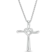 Sweet and simple, this diamond cross pendant speaks to her faith and her heart. Created in sterling silver, this clever design showcases sculpted cross shape. Diamonds adorn the looped heart-shaped center for a hint of sparkle. Captivating with 1/15 ct. t.w. of diamonds and a bright polished shine, this pendant suspends along an 18.0-inch box chain that secures with lobster claw clasp. Cross With Heart, Fav Products, Cross Jewelry Necklace, Cross Shape, Cross Necklaces, Jewelry Design Drawing, Symbolic Jewelry, Diamond Cross Pendants, Heart Shaped Diamond