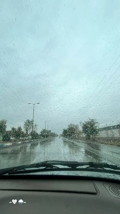 the windshield of a car on a rainy day