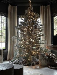 a decorated christmas tree in a living room