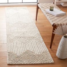 a white runner rug in a living room