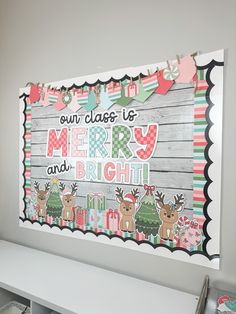 a merry and bright christmas sign hanging on the side of a wall in a room