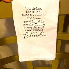 a hand is holding a white towel with the words you drink too much and have questions