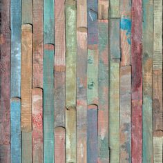 an old wooden wall with many different colors