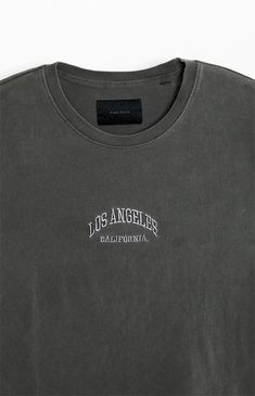 Elevate your streetwear with the Los Angeles Embroidered Vintage Wash T-Shirt from PacSun. Featuring a classic crew neckline and short sleeves, this tee offers a standard fit for effortless style. The front embroidery adds a touch of retro flair, while the vintage wash gives it a worn-in look and feel that's perfect for casual vibes.


	Crew neckline
	Short sleeves
	Standard fit
	Embroidery on the front
	Vintage wash
	100% Cotton
	Machine washable
	Model is wearing size large
	Model Measurements Crew Neck T-shirt With Embroidered Logo For Streetwear, Sporty T-shirt With Embroidered Graphics And Relaxed Fit, Sporty Relaxed Fit T-shirt With Embroidered Graphics, Streetwear Crew Neck Tops With Embroidered Logo, Crew Neck T-shirt With Embroidered Graphics For Streetwear, Urban Tops With Embroidered Logo For Streetwear, Streetwear Embroidered Text T-shirt Crew Neck, Streetwear Embroidered Text Crew T-shirt, Streetwear Crew T-shirt With Embroidered Text