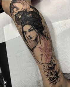 a woman's arm with tattoos on it