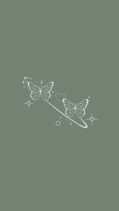 two butterflies flying over the top of each other on a gray background with stars and circles