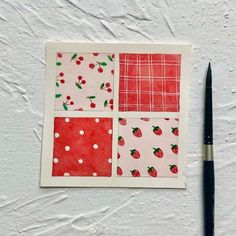 a piece of paper with strawberrys and polka dots on it