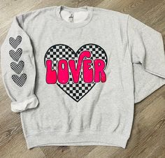 Checkered heart LOVER sweatshirt. Unisex sweatshirt that runs true to size. If you would like in another color not shown just let me know. Long Sleeve T-shirt With Heart Graphic For Streetwear, Heart Graphic Crew Neck Sweatshirt For Streetwear, Casual Sweatshirt With Heart-shaped Graphic Print, Lover Sweatshirt, Checkered Flag, Dirt Track, Handmade Christmas Gifts, Race Day, Dirt Bike