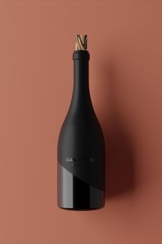 a bottle of wine on a pink background