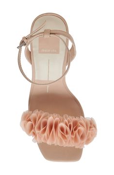 Voluminous ruffles add modern elegance to the vamp of a soirée-ready sandal framed by a squared-off toe and flared block heel. 3 1/4" heel (size 8.5) 3" strap height Adjustable ankle strap with buckle closure Leather and textile upper/synthetic lining and sole Imported High Heel Sandals For Wedding Guests In Spring, Spring High Heel Sandals For Wedding Guest, Spring Wedding Guest High Heel Sandals, High Heel Sandals For Summer Wedding Guests, Summer Sandals With Padded Heel For Wedding Guest, Summer Wedding Guest Sandals With Block Heel, Summer Wedding Guest High Heel Sandals, Summer Sandals With Heel Strap For Wedding Guests, Summer Open Heel Sandals For Wedding Guest