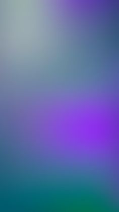 an abstract blurry background in purple and green