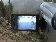 a camera is attached to the side of a vehicle