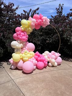 a bunch of balloons that are on the ground