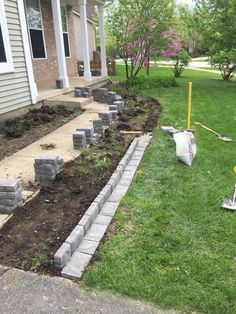 the front yard is being prepared for landscaping