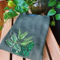 Hey, I found this really awesome Etsy listing at https://www.etsy.com/listing/1343376376/olive-botanical-frog-embroidered Green Embroidered Crew Top, Green Embroidered Crew Neck Top, Green Cotton Sweater With Embroidered Graphics, Green Cotton Sweater With Embroidered Logo, Green Crew Neck Sweatshirt With Embroidered Text, Green Crew Neck Sweatshirt With Machine Embroidery, Green Embroidered Crew Neck Sweater, Green Crew Neck Sweatshirt With Embroidery, Green Embroidered Relaxed Fit Sweatshirt