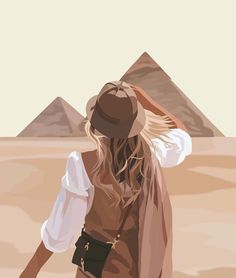 a woman with long hair wearing a hat and vest in front of the pyramids