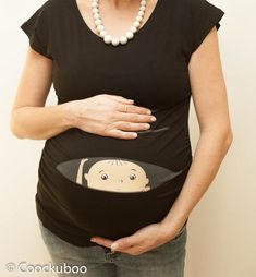 This listing is for a Coockuboo natural baby Or baby girl peeking. Elegant black color maternity shirt. All our maternity shirts are high quality, soft and stretchy and has a very flattering fit. * True maternity shirt - woman flattering sizes : S - XL * Cotton / Lycra - supper soft and Maternity Cotton T-shirt Bump Friendly, Cute Maternity Cotton T-shirt, Cute Maternity T-shirt With Graphic Print, Cute Maternity Graphic Print T-shirt, Pregnancy Wear, Baby Shower Shirts, Gift Idea For Mom, Maternity Shirt, Maternity Tees