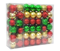 a clear box filled with assorted christmas ornaments