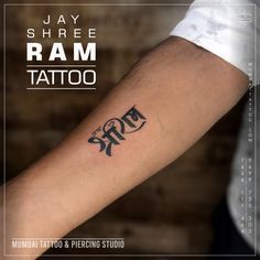 a person with a tattoo on their arm that reads, jay shree ram tattoo