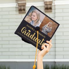 a person holding up a graduation cap with a photo on it and the words, graduate