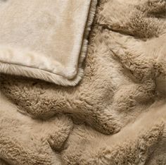 an image of a blanket that looks like sheepskin