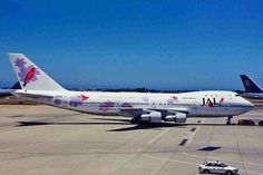 an air canada plane is parked on the tarmac