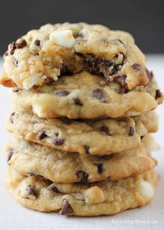 chocolate chip cookies stacked on top of each other